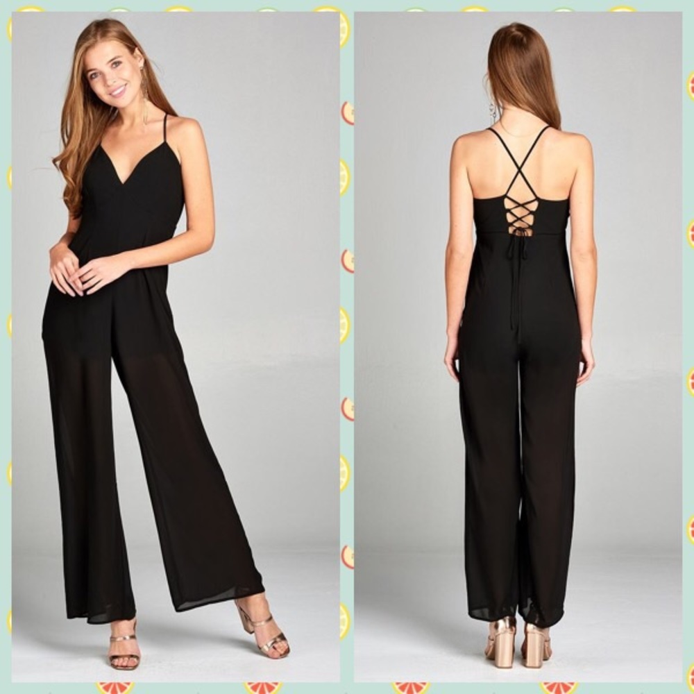 Trendy jumper w/plunging v-neck and cami strap.